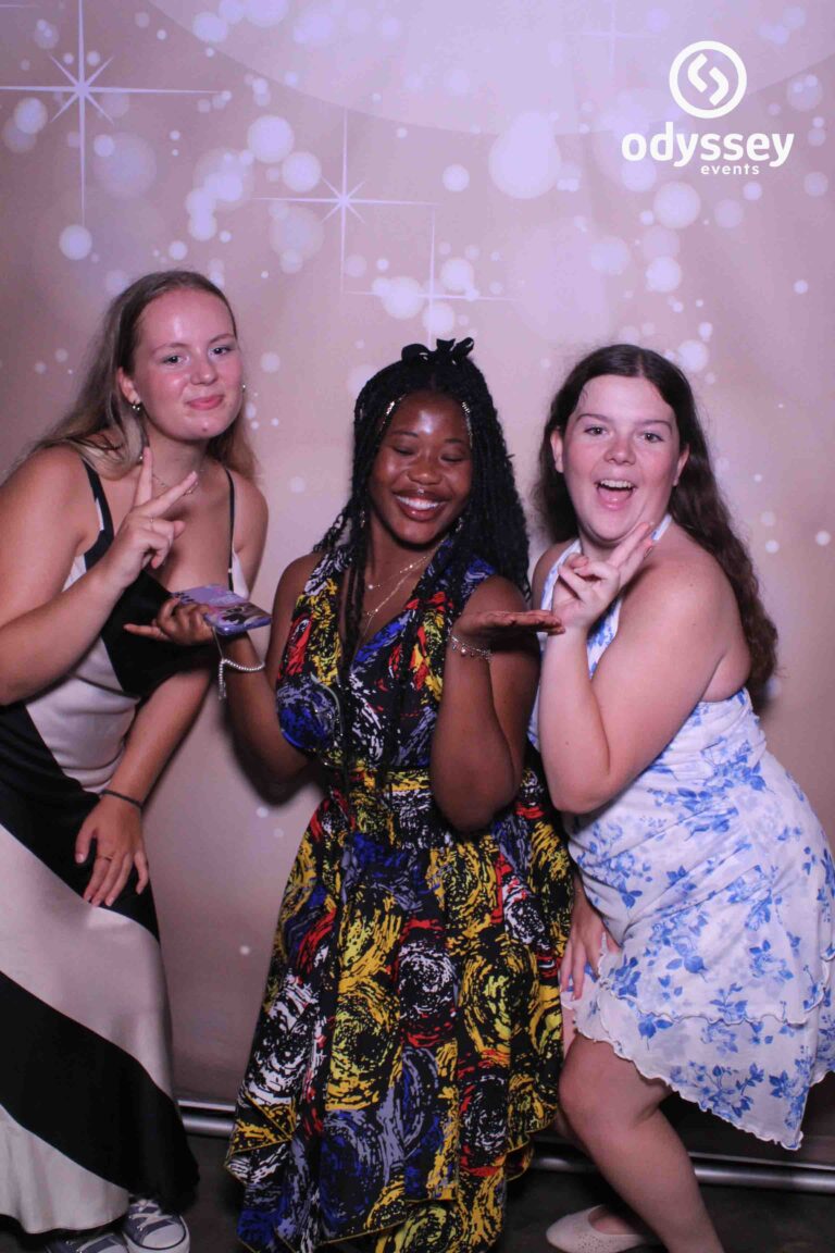 Teenagers posing in front of the Odyssey Selfie Mirror at a 16th birthday party in Langton Green near Tunbridge Wells