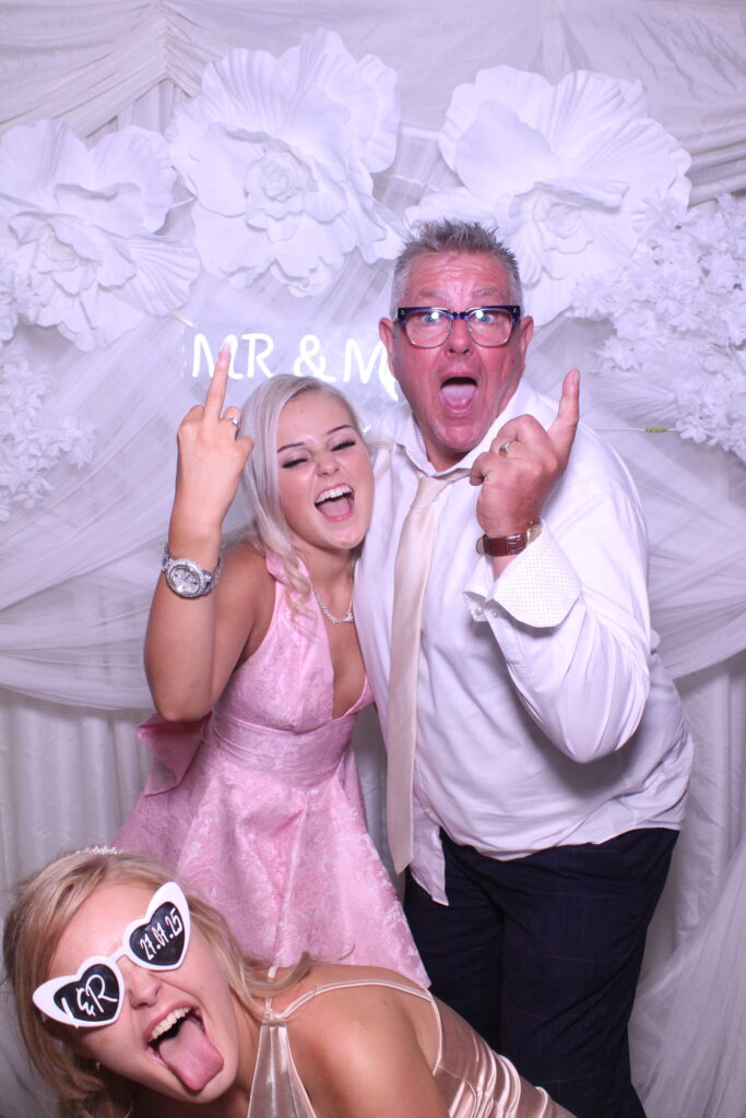 Magic Mirror photobooth set up with elegant wedding table backdrop