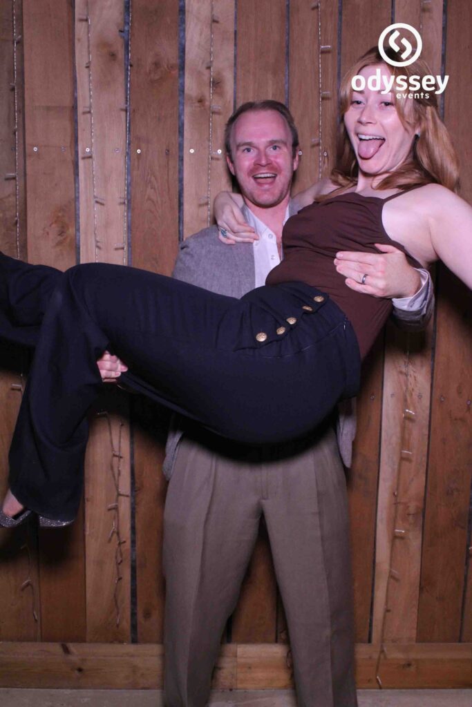 Couple having fun at the wedding selfie mirror at Chafford Park