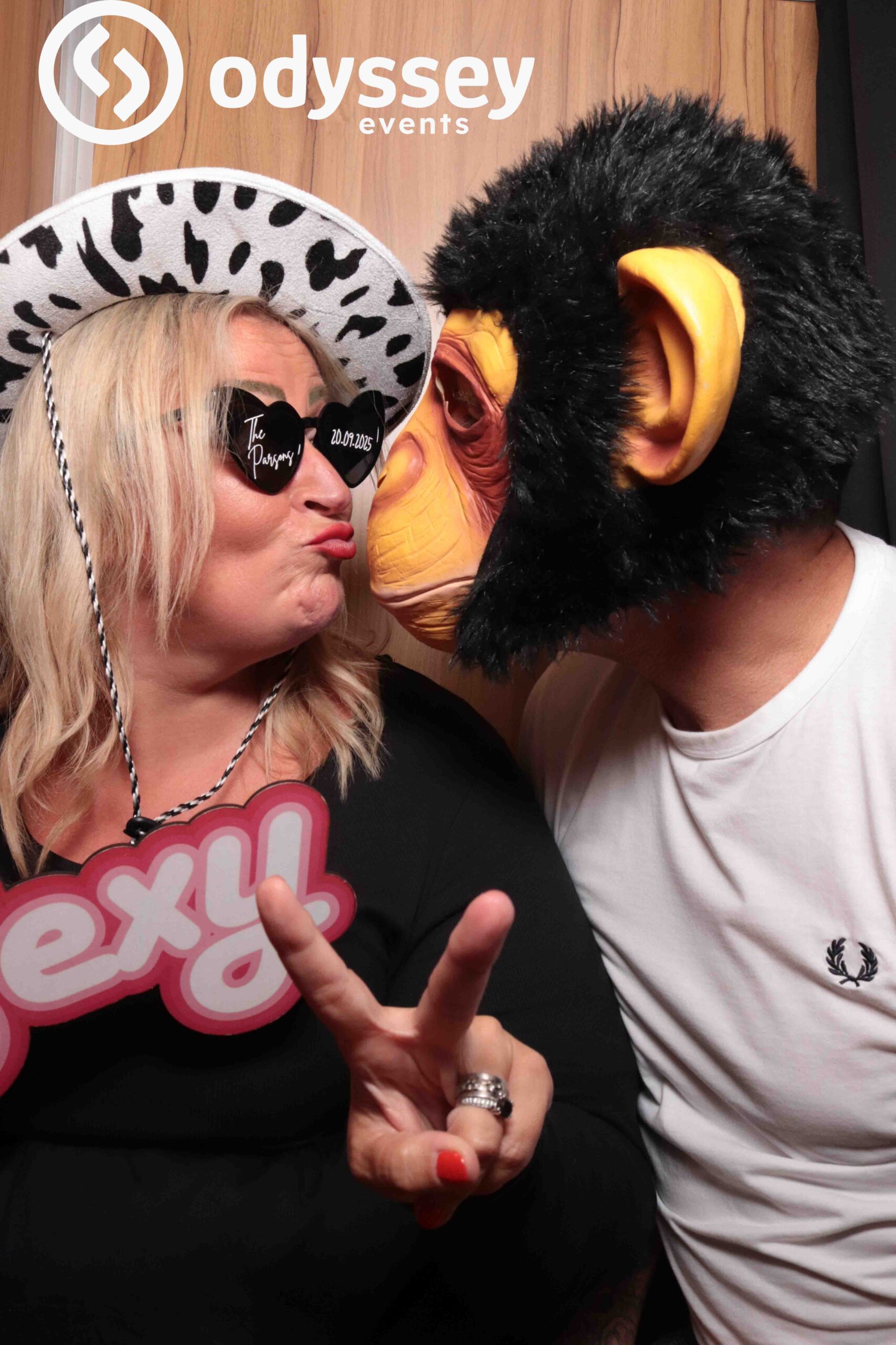 Wedding guests holding Retrobooth photo prints